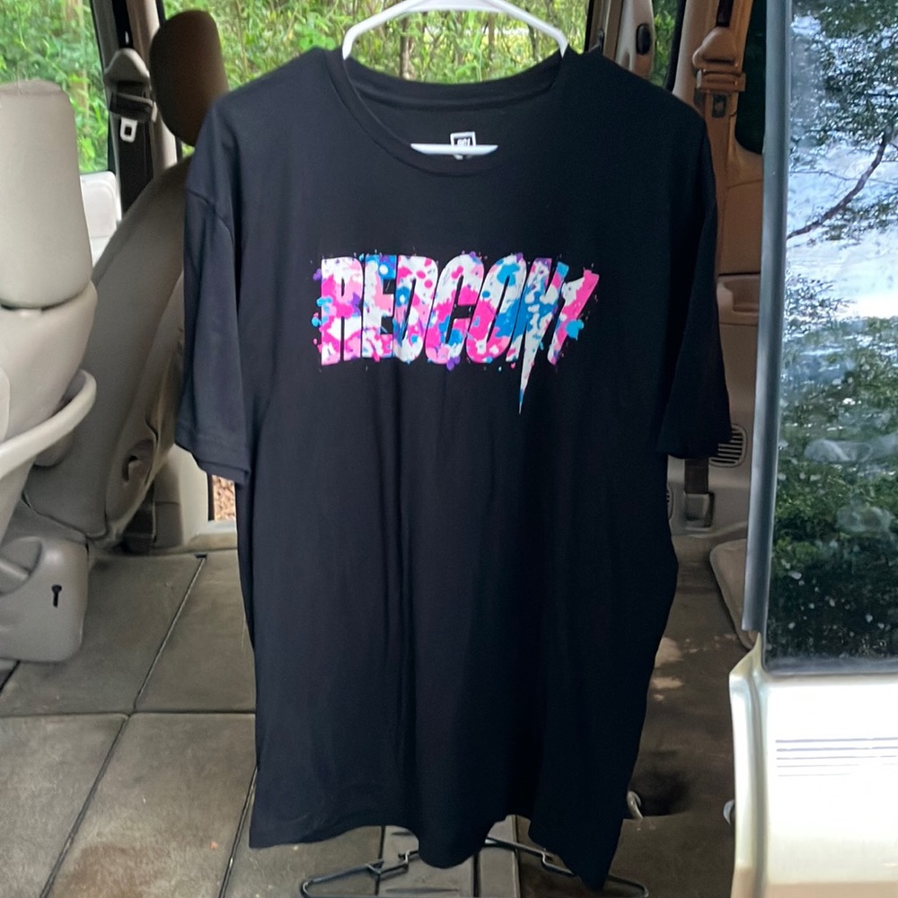 Black shirt with Redcon 1 on the front.